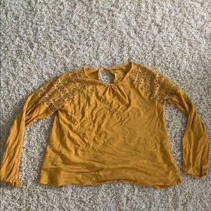 Long sleeved, mustard colored shirt